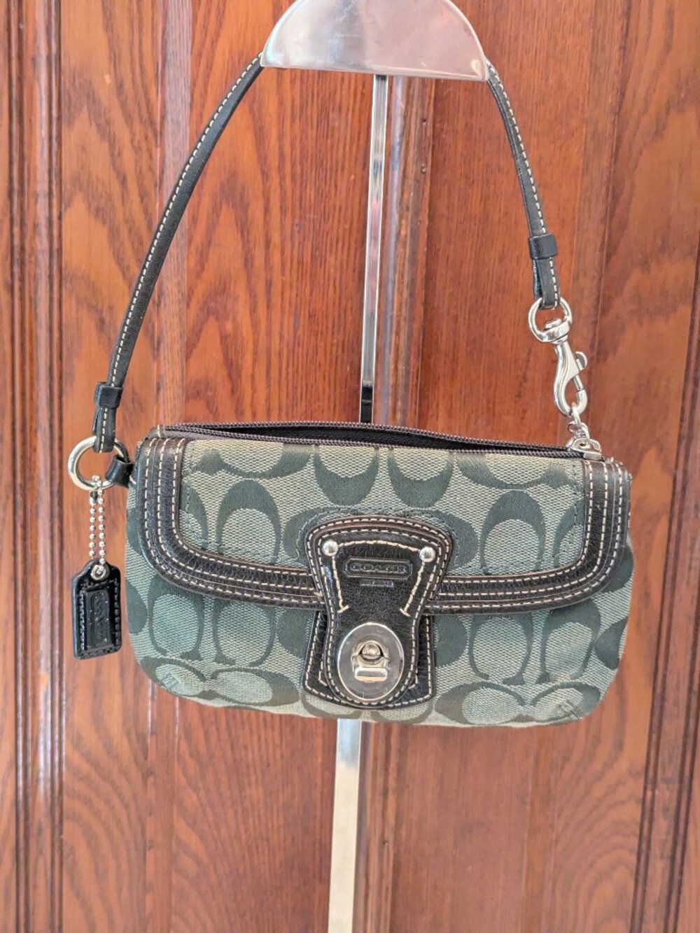 Coach Dark Green turnlock Wristlet
